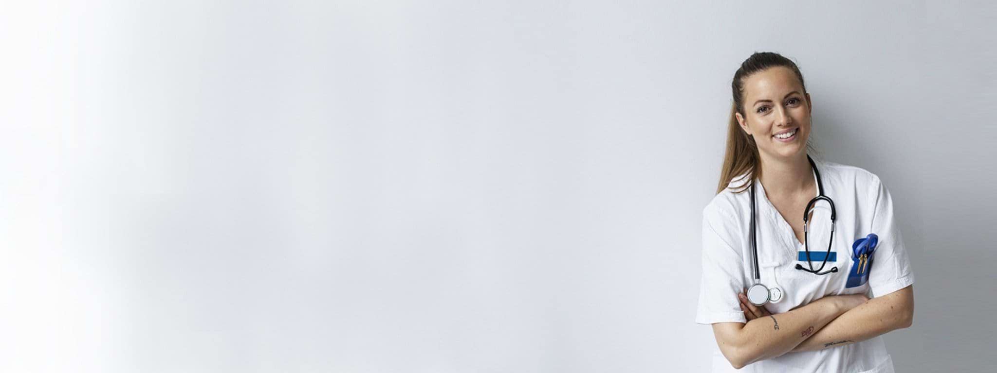 female healthcare working smiling at camera