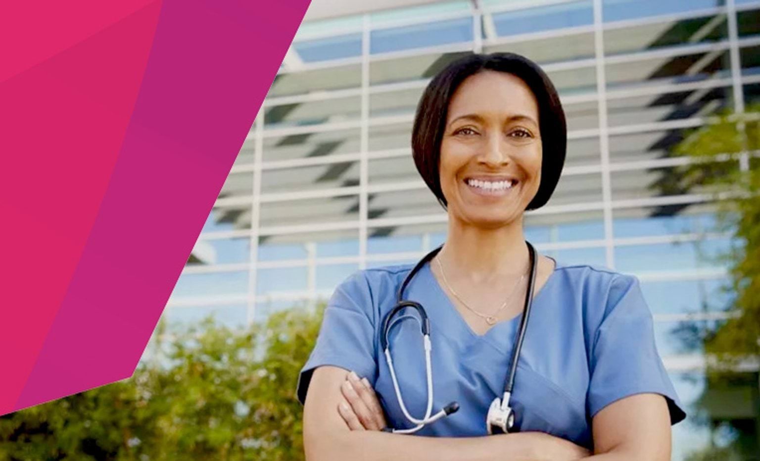 female medical person in front of a building