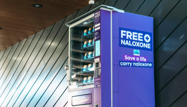 A side view of a naloxone vending machine
